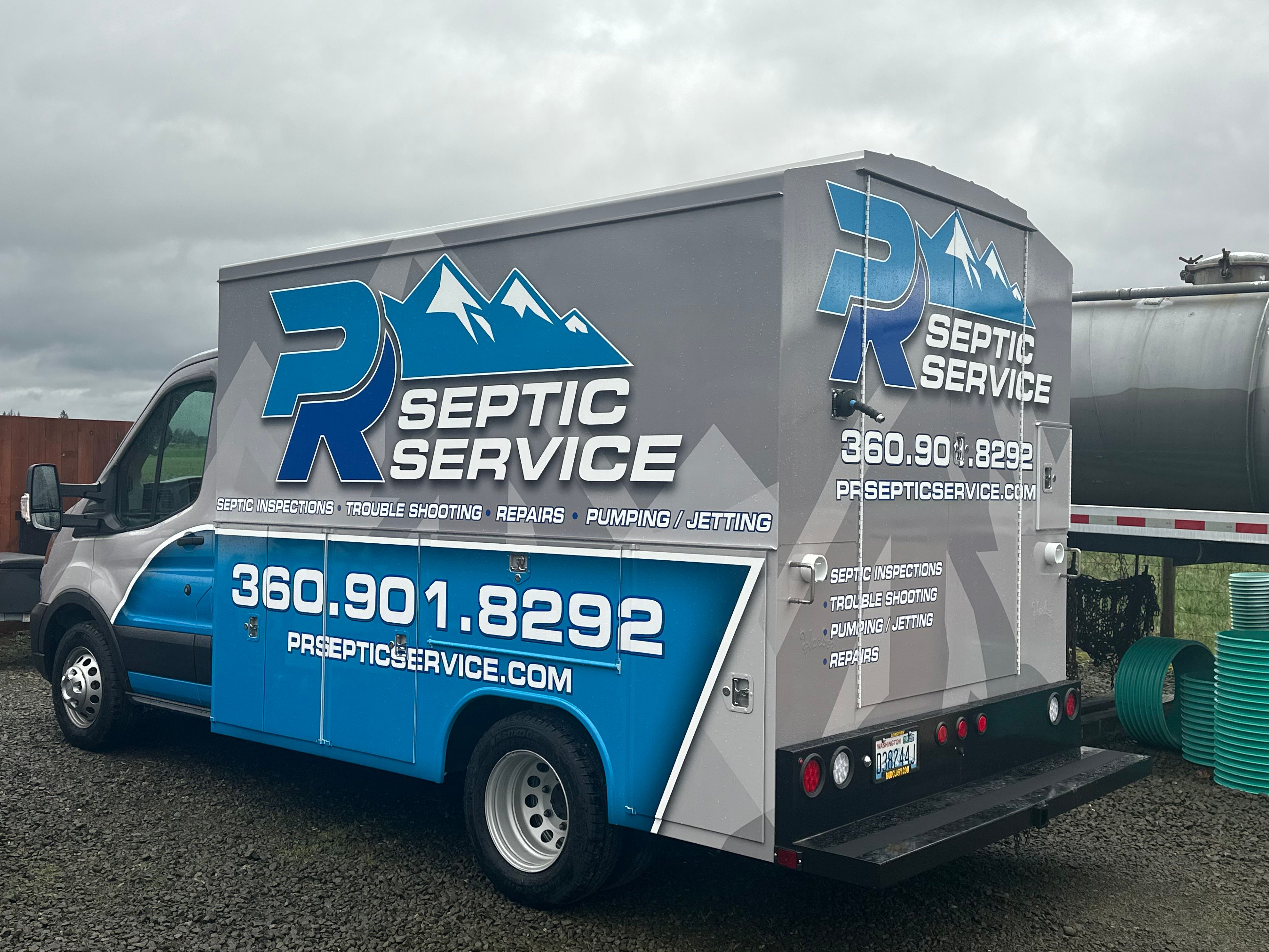 PR Septic Service branded truck